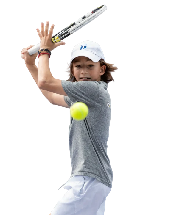 Junior player lining up a backhand
